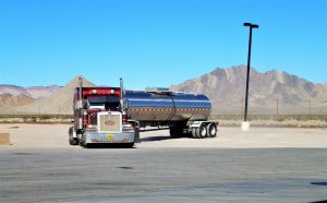 Truck driver paid well to haul loads.